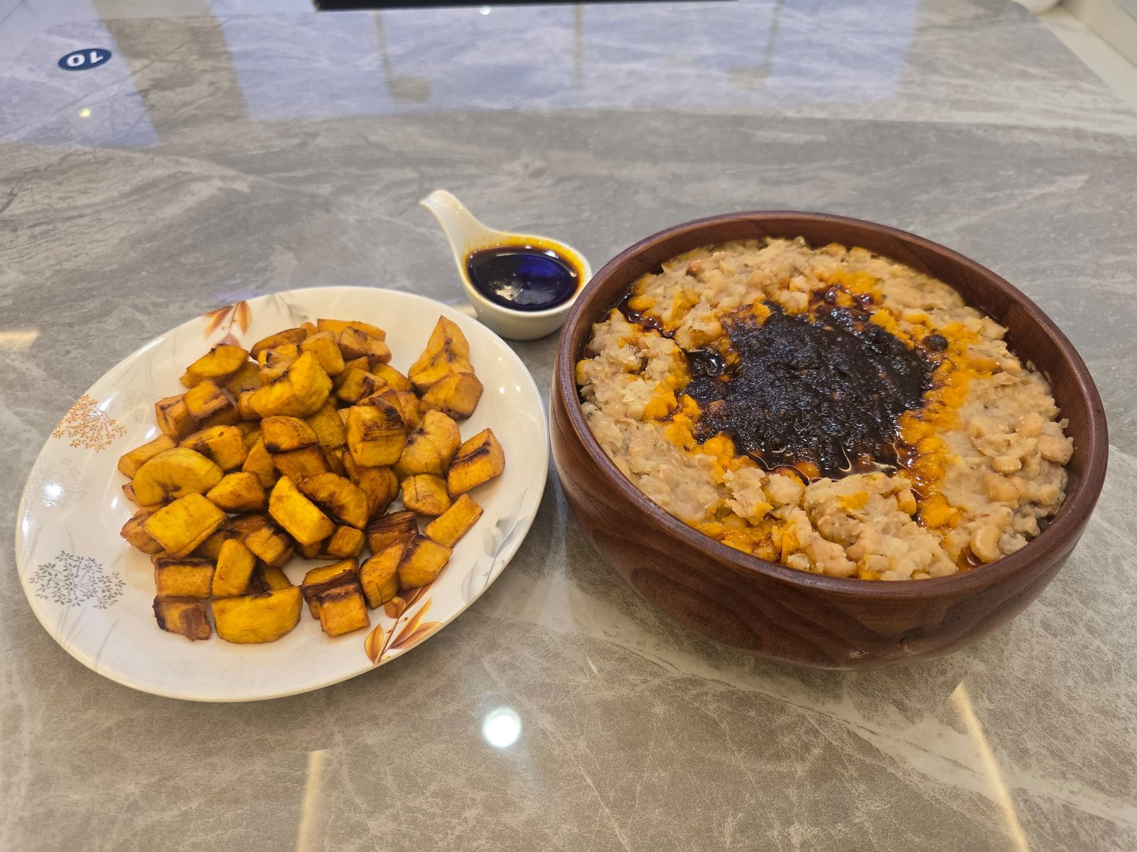 Ewa Agoyin with Bread or Plantain at Oceanova